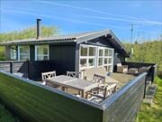 Hyggeligt sommerhus på rolig vej i Rindby