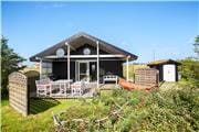 Lille og særdeles hyggeligt sommerhus ved Lild Strand