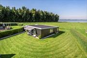 Dejligt sommerhus i første række med havudsigt, kun 100 meter til vandet i Snaptun ved Juelsminde