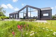 Panoramaaussicht mit Outdoorwhirlpool - modernes Ferienhaus am Skovgårde Strand für 10 Personen
