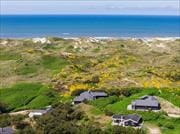 Charmerende sommerhus med sauna og skøn beliggenhed tæt på havet