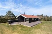 Hyggeligt sommerhus på fredfyldt grund i Grønhøj