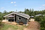 Hyggeligt sommerhus på ugeneret naturgrund