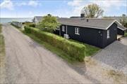 Et dejligt sommerhus med HAVUDSIGT fra udestuen - Ajstrup Strand
