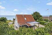 Sommerhus ved stranden – med panoramaudsigt over havet