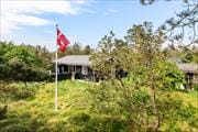 Charmantes Ferienhaus auf einem schönen Naturgrundstück nahe Blokhus Strand