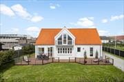 Flot sommerhus i eftertragtet område og med gåafstand til strand
