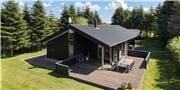 Attraktives Ferienhaus mit einer Sauna in Strandnähe bei Høve Skov