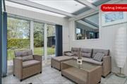 Summer house close to Hald Strand with a cozy courtyard and sunroom