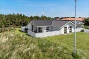 Hyggeligt sommerhus i Vorupør med spabad og sauna