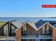 Lækker lejlighed med to terrasser og uspoleret fjordudsigt